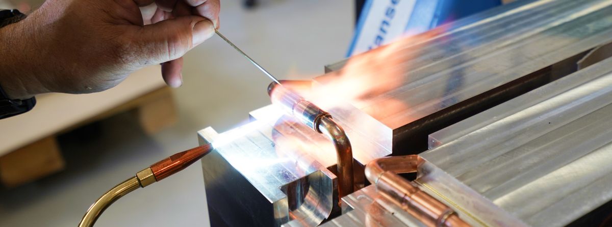 soldering the copper connections on the cooler block
